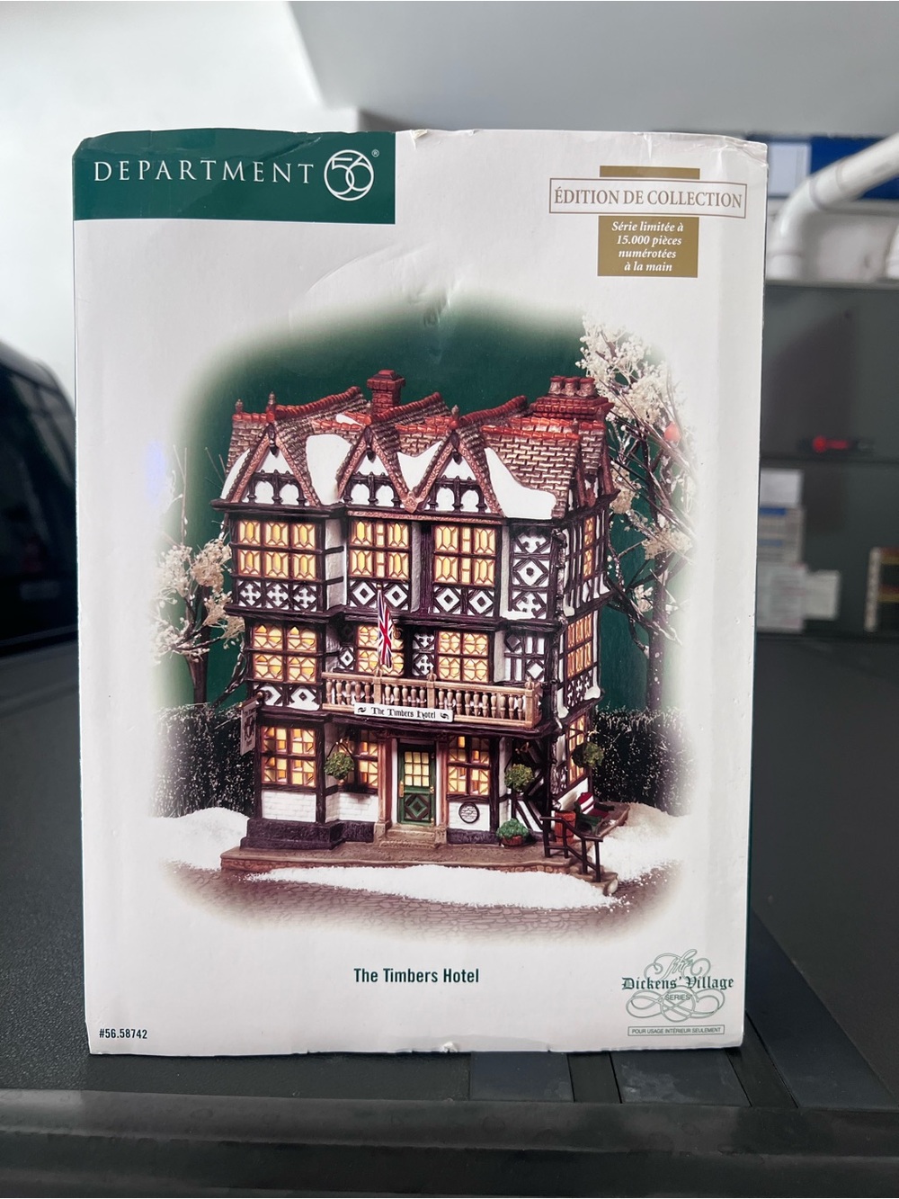 Department 56 Tudor-Style Holiday Hotel in Brown, White, and Gold